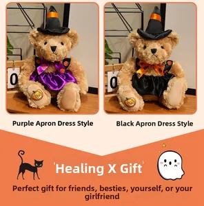 Detail of Halloween teddy bears wearing witch hats and pumpkin embroidered overalls
