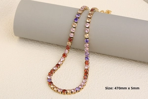 Detail of 18K gold plated rainbow tennis necklace with 470mm by 5mm dimensions