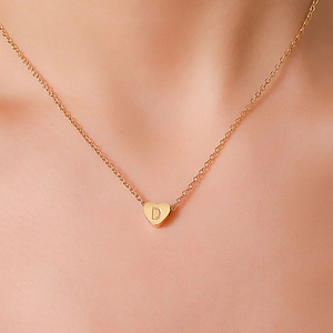 Golden stainless steel heart pendant necklace with engraved letter D for women
