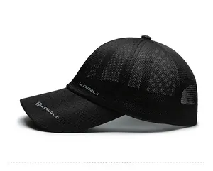 Detail view of a black breathable mesh sun hat with white KAIRUI side logo
