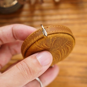 Handmade crazy horse leather mini measuring tape with vintage embossed round case