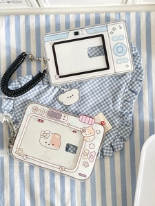 Detail view of camera-shaped acrylic photo card holders with cute bear charms