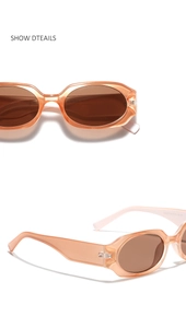 Detail view of oval sunglasses with transparent orange frames and inner temple parameters