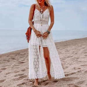 White boho lace V-neck romper dress with cut-out details for a summer beach vacation style