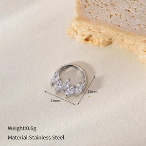 Macro detail of 11mm stainless steel seamless nose ring with marquise cut crystal