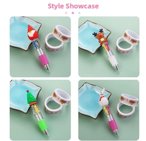 Detail of Christmas multi-color ballpoint pens with cartoon Santa and reindeer toppers