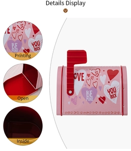Detail display of pink tinplate Valentine mailbox showing printing and inner storage space