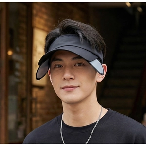 Black outdoor sun visor with retractable side brims shown on a male model outdoors