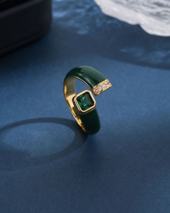 Elegant gold-tone open ring with emerald green enamel and square-cut zircon stone