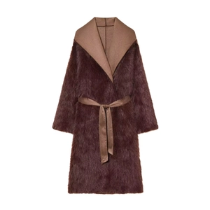 Close-up of faux fur collar and satin waist belt on a slim fit burgundy coat
