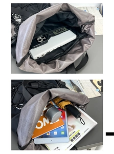 Detail view of large capacity backpack interior showing laptop and daily essentials