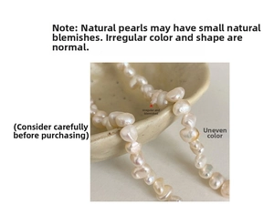 Detailed close-up showing natural baroque pearls with unique textures and cream white luster