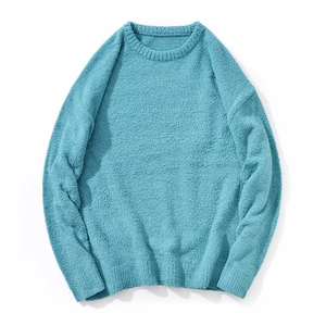 Minimalist blue crewneck knit sweater with thick textured grain finish and long sleeves