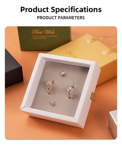 Luxury rose gold jewelry set including rings and earrings in a premium white gift box