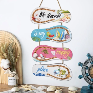 Nautical wooden flip-flop wall hanging with beach patterns and rope hanger for summer decor