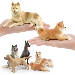 Detailed miniature dog figurines including Husky and Labrador shown for scale on palm