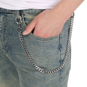 Silver stainless steel skull trouser chain with flat Cuban links shown on jeans