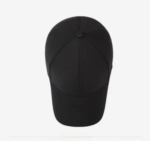 Top down view showing the classic black cotton baseball cap's structured six-panel crown