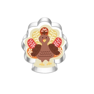 Detail of a stainless steel turkey cookie cutter with a decorated Thanksgiving biscuit