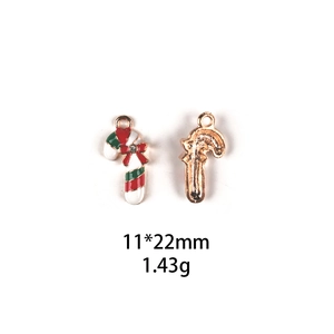 Macro view of Christmas candy cane alloy pendant with size and weight details