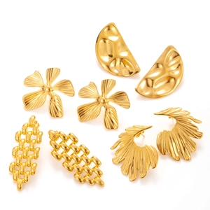 Collection of vintage gold-tone stainless steel floral and textured chunky stud earrings