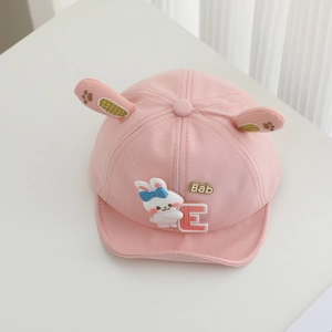 Cute pink baby sun hat with 3D bunny ears and soft cotton fabric for outdoor travel