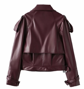 Back view of vintage dark red faux leather jacket with waist belt and shoulder epaulettes