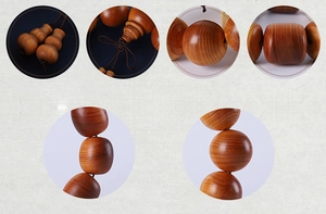 Detailed view of polished Thuja wood beads showing natural oil texture and wood grain