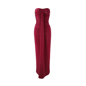Detail of burgundy ruched tube dress with a dramatic vertical drape and sleek silhouette