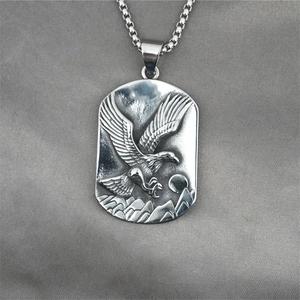 Vintage stainless steel eagle pendant necklace with embossed moon and mountain details