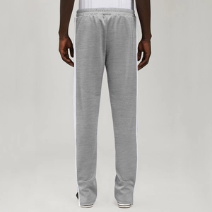 Rear view of men's grey sports trousers featuring white side stripes and elastic waist