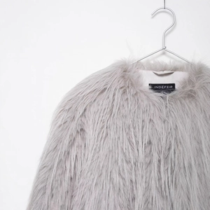 Light purple faux fur coat with a round neck collar and luxury plush texture
