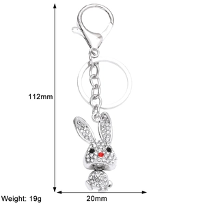 Detail showing bunny keychain dimensions 112mm by 20mm with silver rhinestones