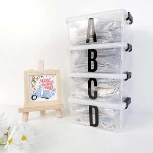 Stackable transparent storage boxes with large letter A-D labels and black side buckles