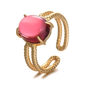 French style gold ring with pink faux stone and twisted band design for women