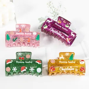 Set of four large Christmas hair claws in glittery pink, green, gold and purple colors