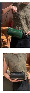 Soft genuine leather cylindrical crossbody bag, fashionable single shoulder handbag for women.