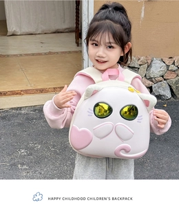 Detail of cute cat preschool backpack with pink ears and reflective sunglasses design