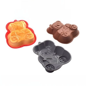 Detailed view of 3D bear-shaped silicone molds for chocolate and cake baking decoration
