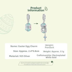Close-up of S925 sterling silver Easter egg charm with enamel and inner cross pendant