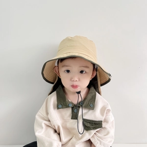 Detail view of khaki children fisherman hat with neck flap and adjustable chin strap