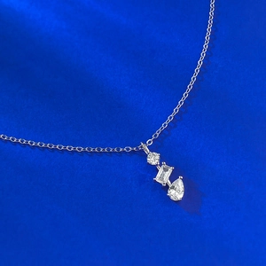 S925 silver necklace featuring a geometric pendant with round, square, and teardrop crystals