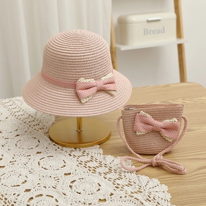Pink straw sun hat and matching crossbody bag set with polka dot bow for women and girls