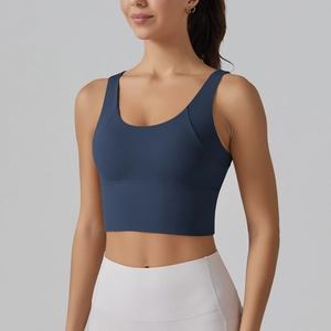 Front detail of navy blue V-back sports bra featuring a wide waistband for extra support