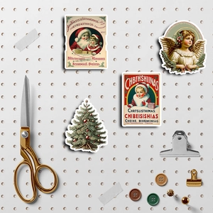 Macro shot of 4 vintage Christmas stickers featuring Santa and angels on pegboard