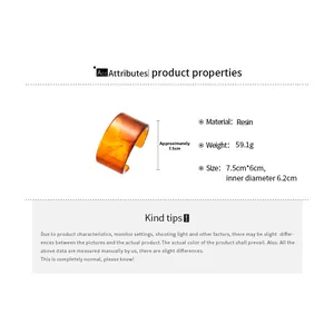 Detail specifications for amber resin cuff bracelet showing dimensions and 59.1g weight
