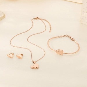 Rose gold elephant jewelry set featuring necklace earrings and bracelet with crystals