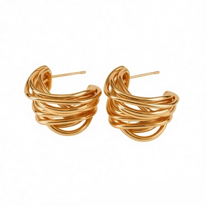 Gold plated multi-layer C-shaped intertwined hoop earrings with a metallic finish