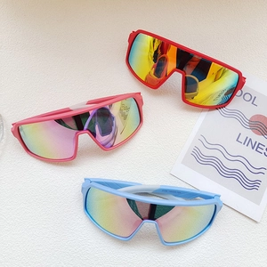 Three pairs of kids cycling sunglasses with vibrant colorful lenses and matte frames