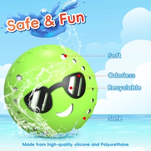 Reusable green silicone water balloon toy with smiley face and splash effect